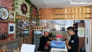 Sie AA: QRIS Solusi Pembayaran, Tinggalkan Uang Tunai?